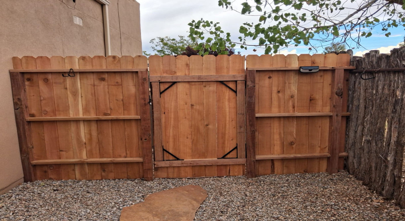 Custom Wooden Perimeter Fence and Gate Construction