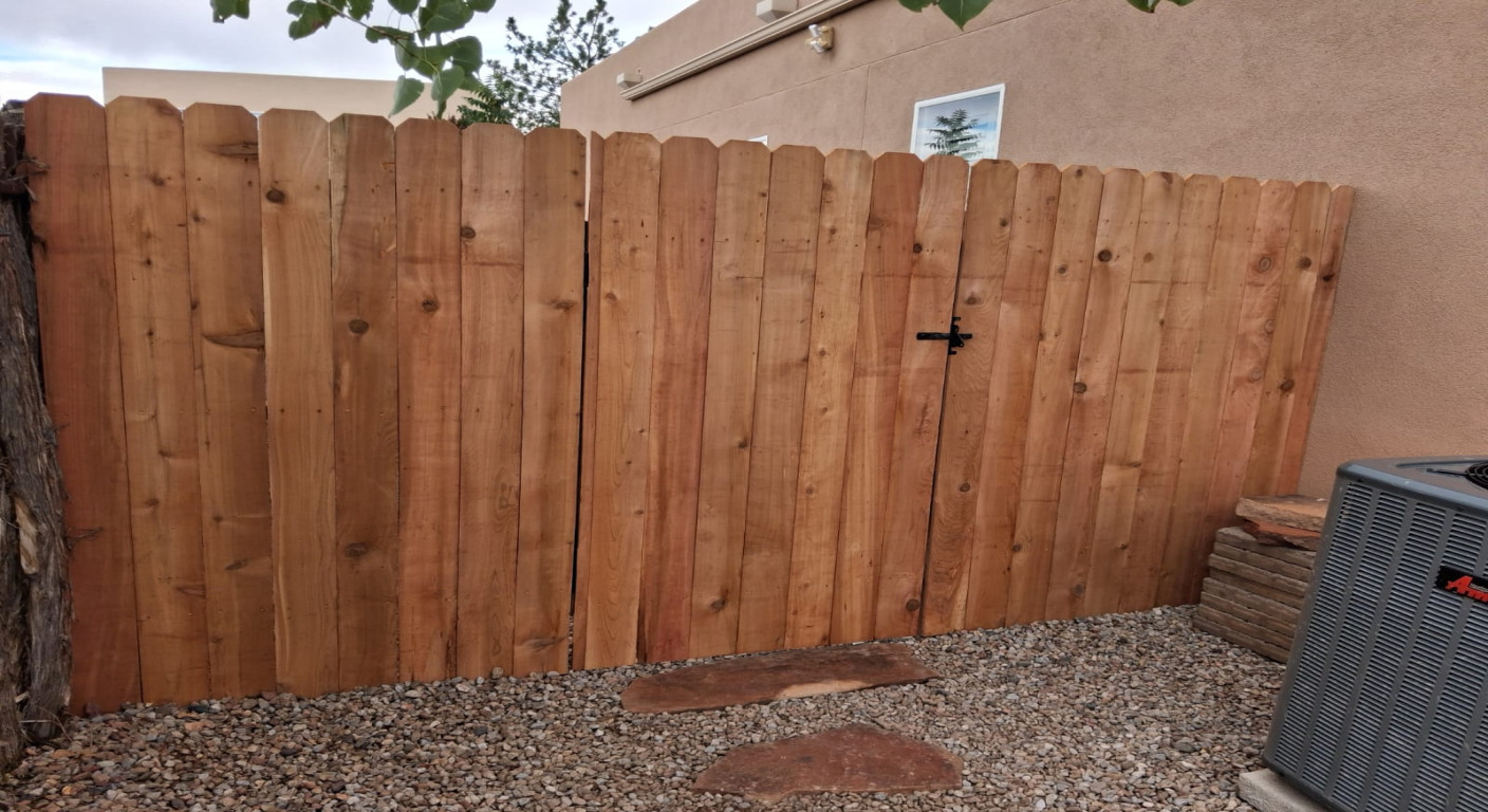 Custom Wooden Perimeter Fence and Gate Construction